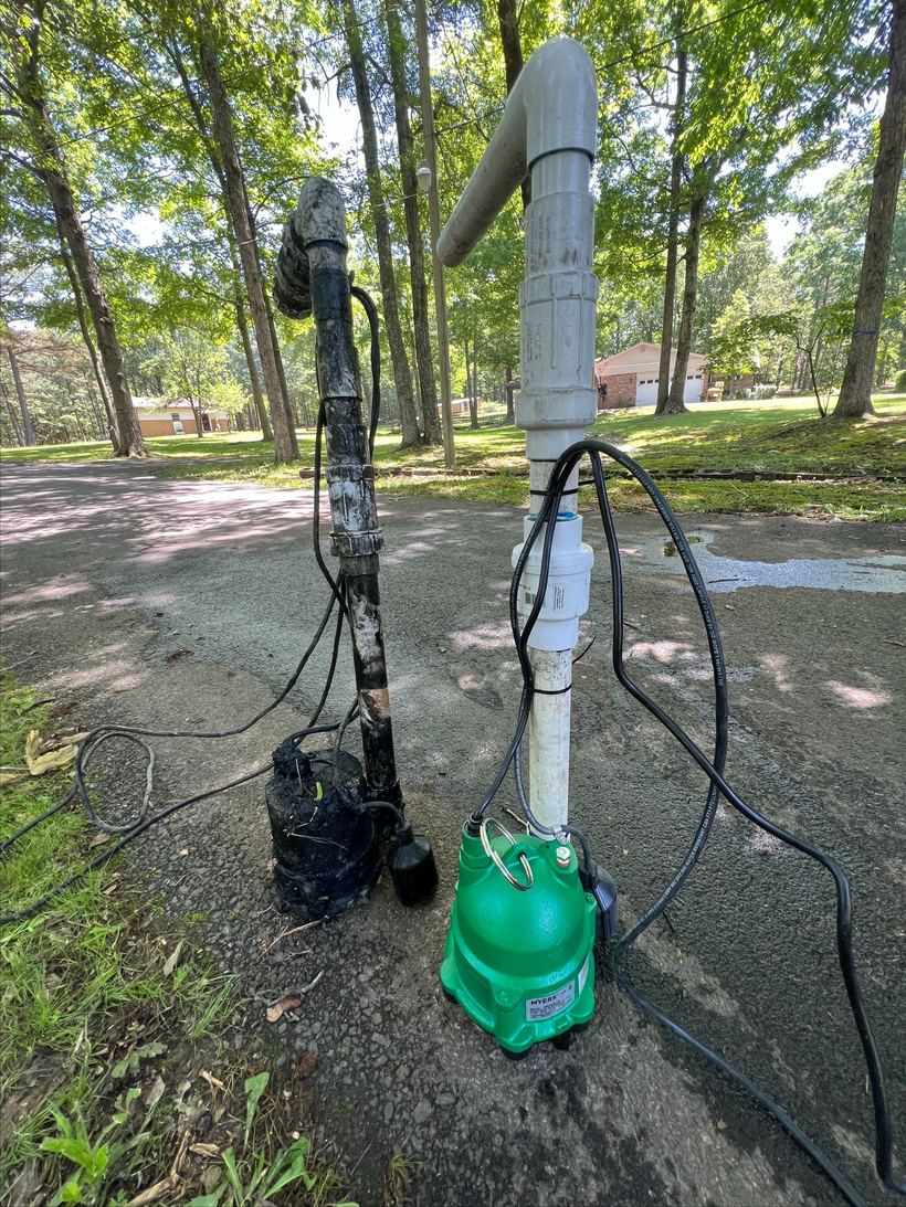 Failed septic lift pump next to the new replacement pump